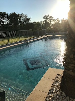 Sunset over pool