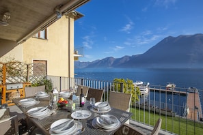 Dining al fresco by the terrace with amazing view of the lake