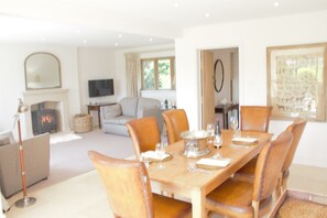 Dining room open plan to sitting room