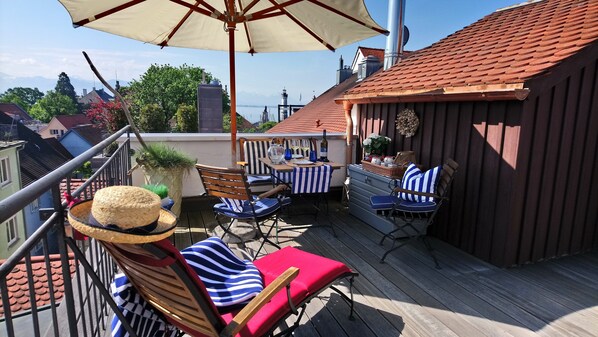 The rooftop terrace has great views of the harbor entrance, lake and mountains