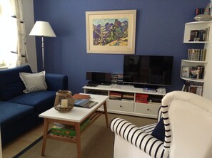 Livingroom with: Radio/CD, DVD with movie collection, TV with 32 cable channel