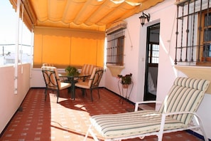 Terrace. Extensive private terrace (30m2), very sunny (south facing) with awning and garden furniture.