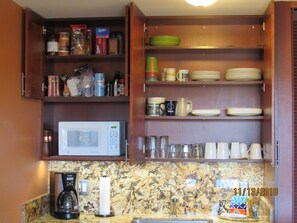 Fully stocked cabinet.   