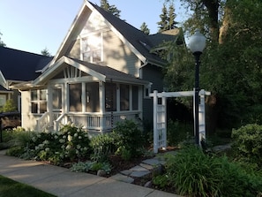 Take a stroll thru the lovely side perennial garden.