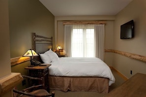 Drift off to sleep in the plush double bed. Bedding configurations may vary