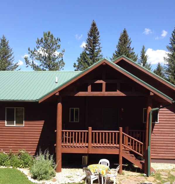 Your porch--spacious, with flagstone surround for the grill