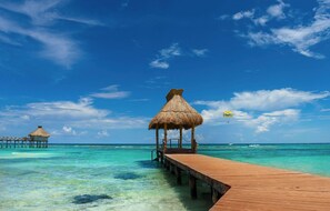 Different shades of blue and the fascinating boardwalk on the ocen