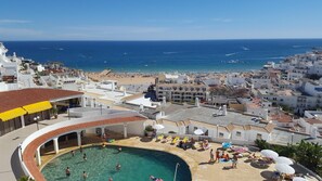view from the residence on the beach the pool ;the old town and l'ocean 