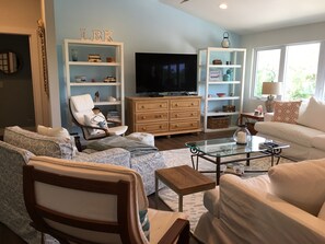Two oversized couches and plenty of seating for movie nights with the whole gang