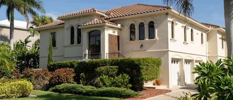 Sand Castle a gorgeous, large four bedroom four bath pool home on the 7th fairway of the Sanibel Golf Club, minutes to the beach.