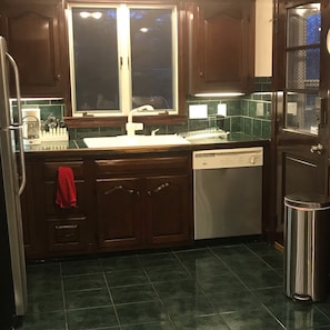 Sanitizing dishwasher makes after dinner clean-up a breeze.