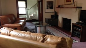 Living Room fireplace, smart tv, and wifi make for comfortable evenings.