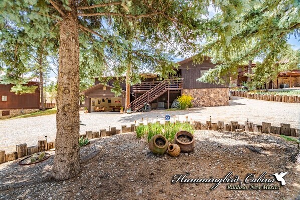 Entry with circle gravel driveway