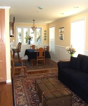 Enjoy the comfort of hardwood floors, oriental rugs and antique furniture.