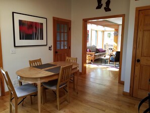 Dining area looking into living room.