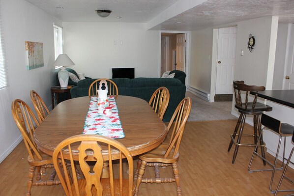 Plenty of seating at the table and bar.
