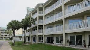 our unit is on the 3rd floor with extended balcony by the palm trees