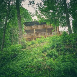 Wrap around balconies allow for a spectacular treetop view to enjoy the brook
