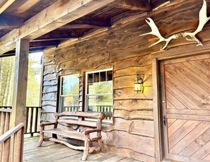 Wrap around balcony offers treetop view of brook, flora, and fauna. 