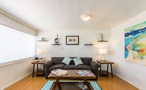 Living room with sofa bed.