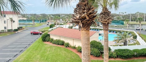 Third floor view to the clubhouse and pool