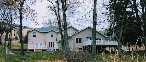 Upstairs main area w/full kitchen, TV, gas stove, exercise eqpt. & walk out deck