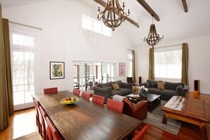 Living room and dining room, looking out to pool