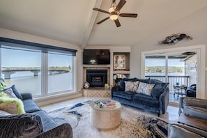 Living room lake views and patio to right. Enjoy your stay. 