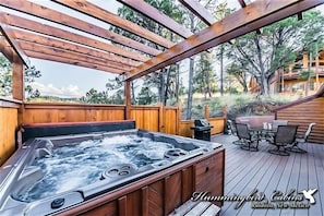 Spacious back deck with private hot tub