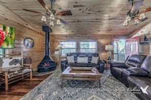 Living room with wood burning fireplace