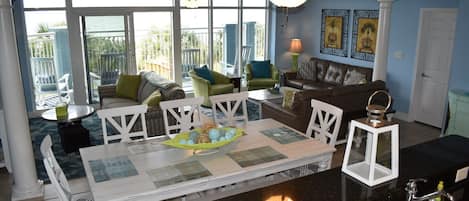 Large Bright Ocean Front Living Area Leading to Huge Balcony