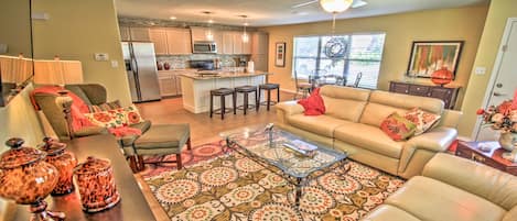 Leather sofa and loveseat each with two comfortable recliners.