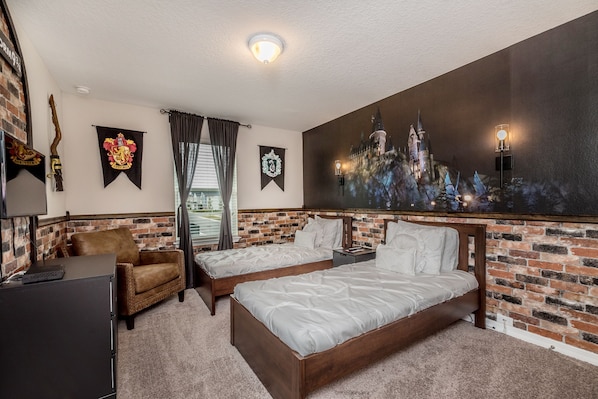 - Experience the magic of our themed room, complete with two cozy single beds. - Stunning wardrobe with sufficient space - Enjoy the Availability of Smart Tv and Netflix - Indulge in mesmerizing views from the windows of the room