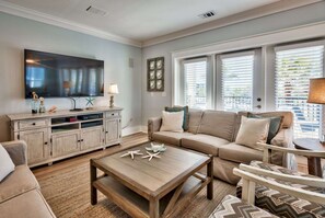 Spacious Living Room Featuring a Flat Screen TV