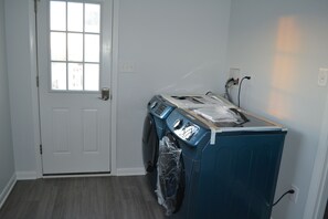 Laundry room - door leads to back deck