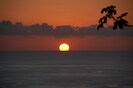 The sun grows larger as it sets.  