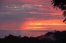 The sunset is beautiful even when the clouds are around