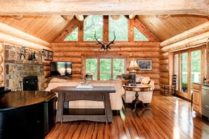 Living room with wood-burning fireplace 