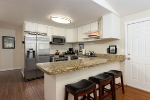 Newly remodeled kitchen with all cookware and bake ware