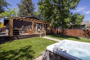 Private backyard area with hot tub, fully fenced