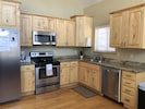 Kitchen with granite countertops and stainless steel appliaances