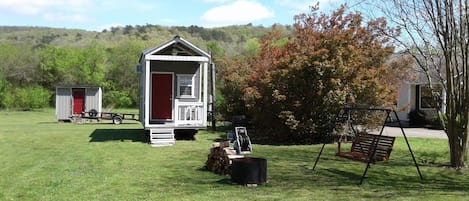 fire pit and swing your going to Love your Tiny House Experience 