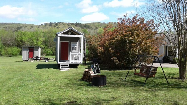 fire pit and swing your going to Love your Tiny House Experience 