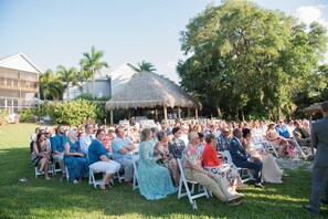 Beautiful group gathered for a celebration by the river.