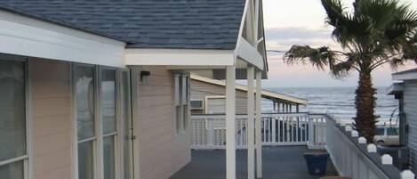 Front door and eastward balcony