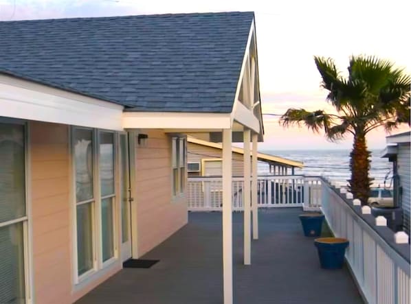 Front door and eastward balcony