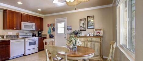 Spacious kitchen with an expandable table and chairs