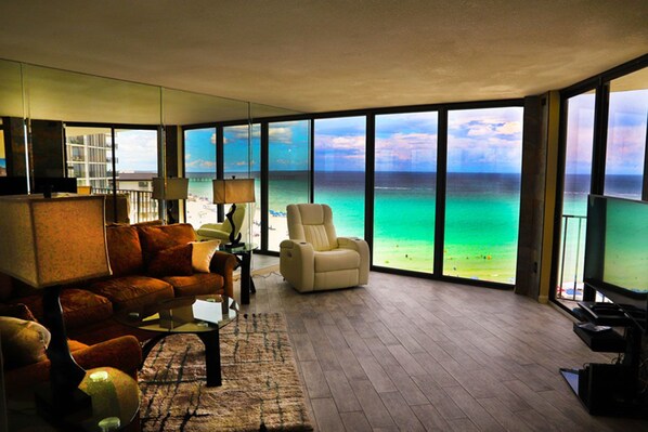 Living Room overlooking the water, called the “Emerald Coast”.
