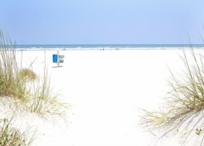 Enjoy the soft white sand and our beautiful beach, just steps away!