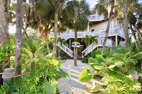 Tropical landscape, Key West style w/ grand double staircase. *New pic coming